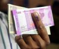 Rupee rebounds on dollar retreat; up 12 paise