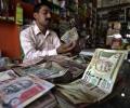 Rupee snaps 2-day gains, ends down 31 paise at 68.38