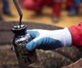 World is drowning in oil; US crude drops below $28