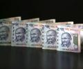 Rupee hits 1-wk high of 67.08, gains 9 paise