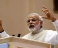 Modi to take up black money issue with Switzerland