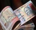 Rupee weakens further to 67.48, ends down 17 paise