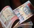 Rupee snaps 3-day winning spree, down 6 paise to 67.11