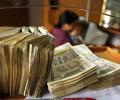 Banks' deposit base to take Rs 1.5-2 lakh cr hit