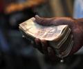 Rupee ends firmer at 66.82 on dollar selling, up 13 paise