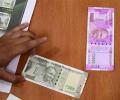 When were the new Rs 500, Rs 2,000 notes actually approved?