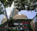 Late buying lifts Sensex, exit polls take centrestage
