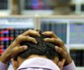 Sensex tanks 448 points on global sell-off, falling rupee