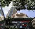 Sensex spurts 96 points in see-saw trade; metals shine