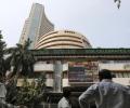 Sensex extends losses; metal, banks drag