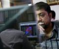 Oil, banking stocks drag Sensex down 184 points