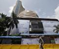 Sensex, Nifty slip as BJP's lead in K'taka narrows