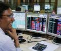 Sensex, Nifty log 1st gain in four sessions