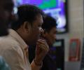 Sensex pares intra-day gains to end 52 points lower