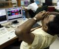 Markets end in red; RIL, HDFC twins top drags