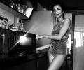 Karisma smiles while Ira cooks in a swimsuit!