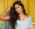 Will Katrina's father attend her wedding?