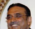 Zardari 'travels' as Pakistan 'burns'