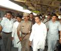 Image: Rahul defies Sena, takes Mumbai local train