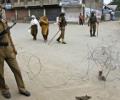 PM's visit, Geelani's strike paralyse Kashmir
