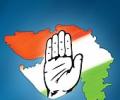 Congress woos Gujaratis with free laptops, 16 pledges