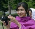 Malala 'up and walking', says her father