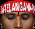 Two more Andhra ministers quit over Telangana