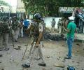 Cops among 19 injured, police vans torched in West Delhi clash