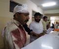 52 killed in twin suicide blasts in northwest Pakistan