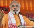 Modi urges Advani to reconsider resignation