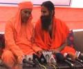 Don't talk of money when mics are on: Ramdev to BJP candidate