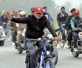 Akhilesh will ride his cycle in MP; SP to contest all 230 assembly seats