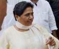 Mayawati demands dismissal of UP govt, stages walkout in RS