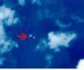 China locates suspected crash site of missing plane