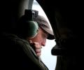 MH370 search: Planes scour new area as more objects spotted