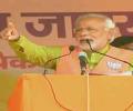 Modi seeks vote for tainted candidate in Bihar