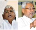 It's official: Nitish Kumar joins hands with Lalu, to contest elections together