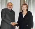 Will look into German language row: Modi assures Merkel