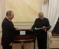 Putin gifts Modi 18th century sword and Bapu's handwritten notes