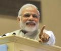 Modi takes a dig at Kejriwal over power bills