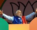 Modi makes poll promises in Delhi; targets 'anarchist' Kejriwal