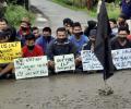 Defying curfew protesters in Imphal came out to streets to block roads