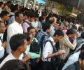 PHOTOS: Mumbai hassled with train delays, traffic snarls for second day