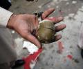 Asked how it works, cop pulls pin off grenade in Pak court