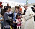 'You are not alone': Pope brings 3 refugee families from Greece to Rome