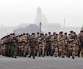 Why are French troops marching down Rajpath?