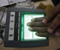 Aadhaar not must, says Centre as Opposition forces RS adjournment