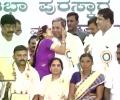 Fan love! Female admirer publicly kisses Siddaramaiah