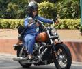 Congress MP Ranjeet Ranjan rides a bike to Parliament