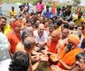 Amit Shah takes holy dip alongside Dalit sadhus at Kumbh